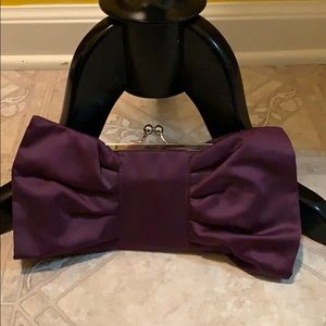 Royal purple bow clutch